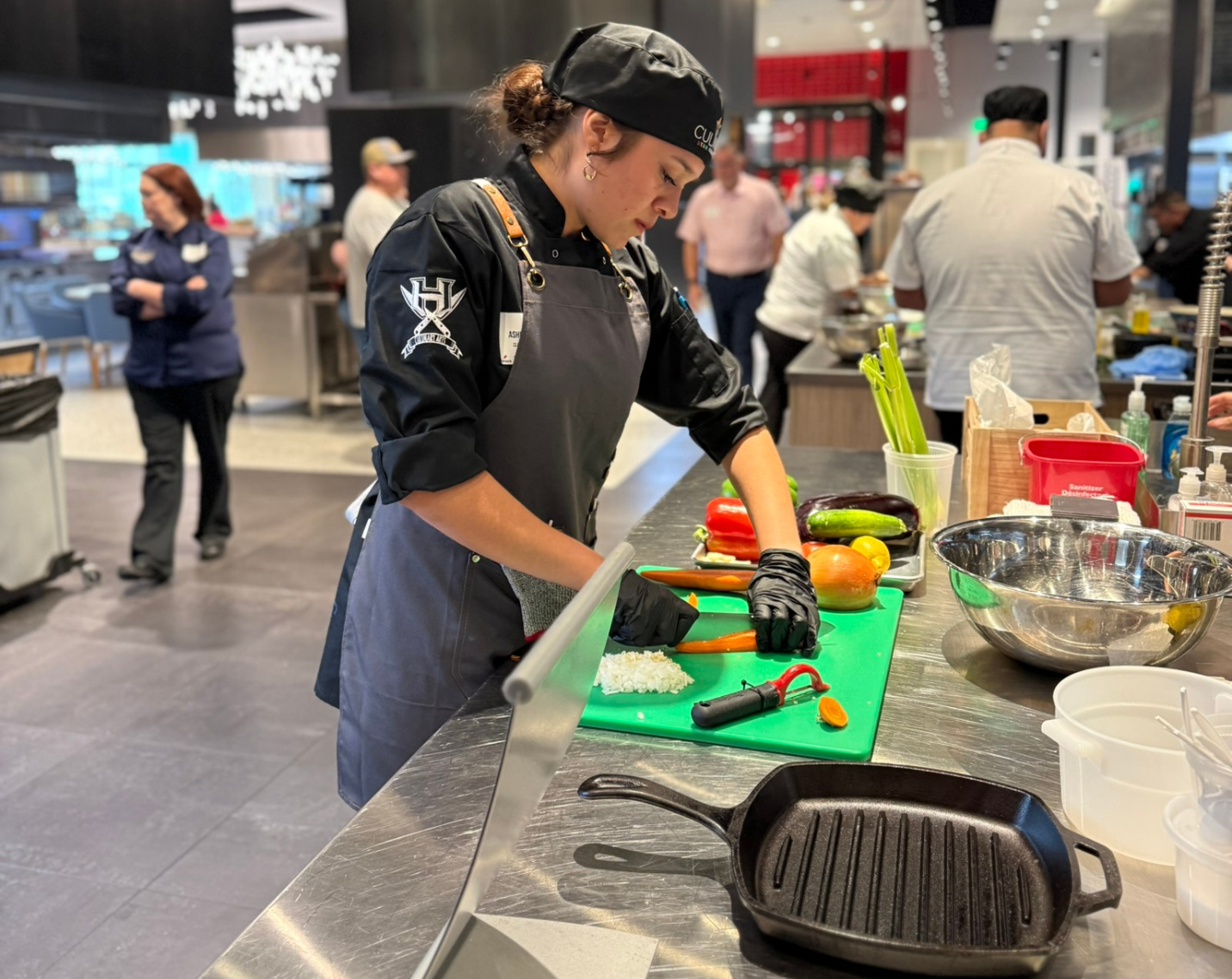 A student participates in the Aramark Student Nutrition Culinary Star competition.